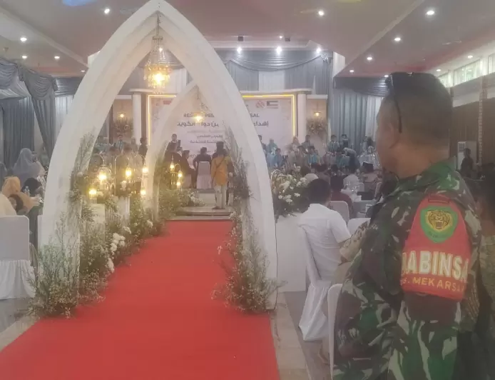 Babinsa Koramil 0621-06/Cileungsi Hadiri Resepsi Pernikahan Masal